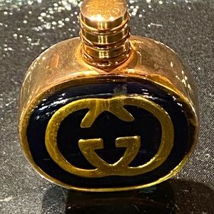 Gucci: Perfume Bottle Vintage Round Iconic GG Logo. 1980s for collectors.